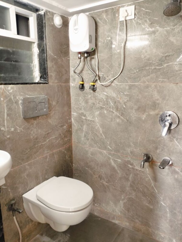 Bathroom, rna-ng-aroma 1 Bedroom 610 Sq.Ft. Apartment In Mira Road East Thane 10548153