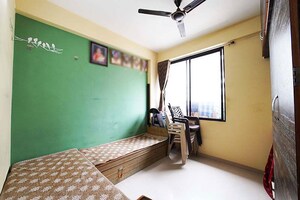 Living Room in 2 BHK Apartment at Nava Naroda – for Sale