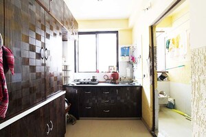 Kitchen in 2 BHK Apartment at Nava Naroda – for Sale