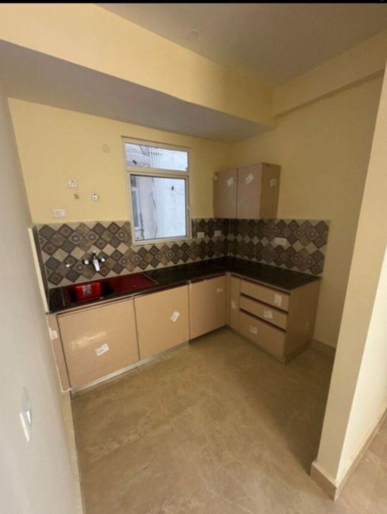 Kitchen, signature-global-park-4-and-5 2.5 Bedroom 1081 Sq.Ft. Builder Floor In Sohna Sector 36 Gurgaon 10548196