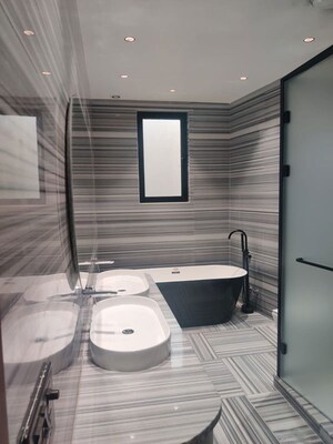 Bathroom in 4 BHK Builder Floor at Green Park Extension – for Sale