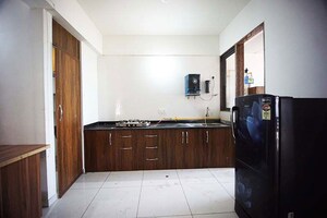 Kitchen in 2 BHK Apartment at Ramdev Altezza, Zundal – for Sale