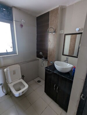 Bathroom in 2 BHK Apartment at Unitech Uniworld Gardens 2, Sector 47 – for Rent
