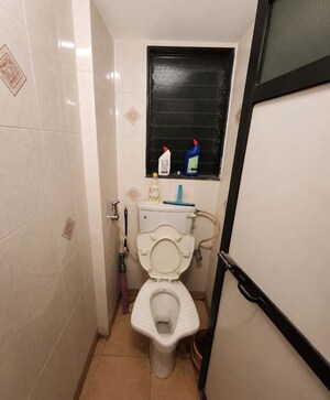 Bathroom in 1 BHK Apartment at Greenfield Rocks CHS, Jogeshwari East – for Rent