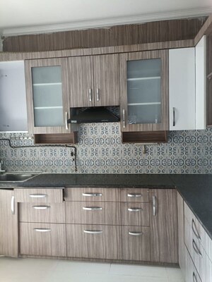 Kitchen in 2 BHK Apartment at Aims Golf City, Sector 75 – for Rent