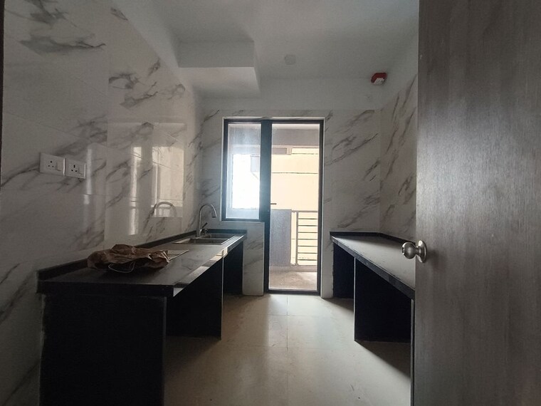 Kitchen, risland-the-icon 2 Bedroom 670 Sq.Ft. Apartment In Dhokali Thane 10548402