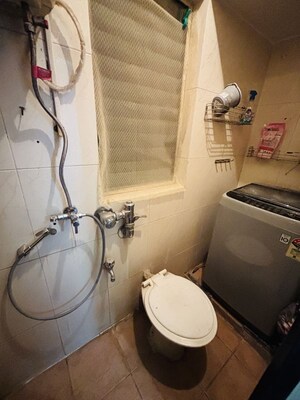 Bathroom in 2 BHK Apartment at Marathon Cosmos, Mulund West – for Rent