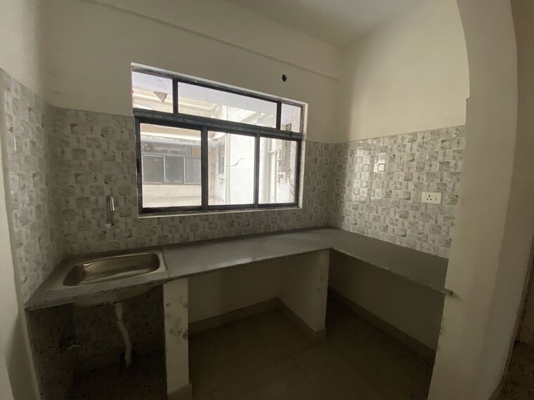 Kitchen, meena-paradise  870 Sq.Ft. Apartment In Rajarhat Kolkata 10548363