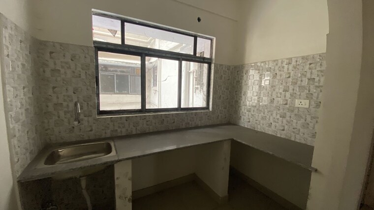 Kitchen, meena-paradise  870 Sq.Ft. Apartment In Rajarhat Kolkata 10548363