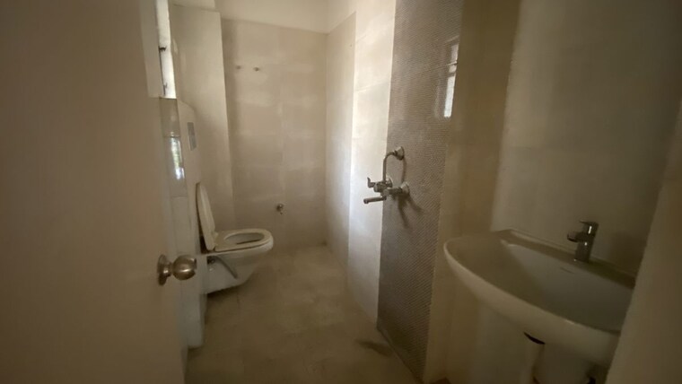 Bathroom, meena-paradise  870 Sq.Ft. Apartment In Rajarhat Kolkata 10548363