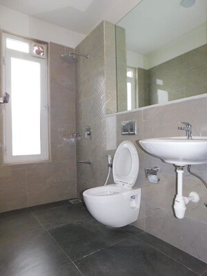 Bathroom in 2 BHK Apartment at Omkar Alta Monte, Malad East – for Sale