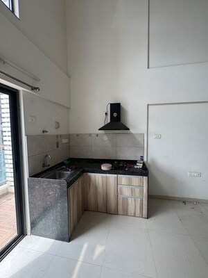 Kitchen in 1 BHK Apartment at Gera Adara, Hinjewadi – for Rent