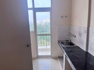 Kitchen in 2 BHK Apartment at Sushant Golf City – for Rent