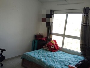 Bedroom in 2 BHK Apartment at Mittal Pebbles High Mont, Hinjewadi – for Rent