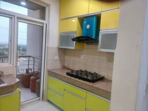 Kitchen in 2 BHK Apartment at Ansal Highland Park, Sector 103 – for Rent