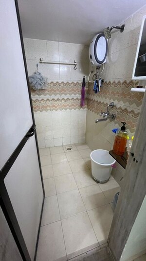 Bathroom in 1 BHK Apartment at Mahavir Shraddha, Kopar Khairane – for Rent