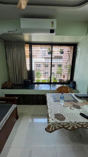 Living Room in 1 BHK Apartment at Mahavir Shraddha, Kopar Khairane – for Rent