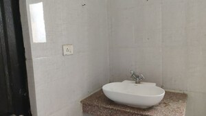 Bathroom in 2 BHK Apartment at Gaur Atulyam, Omicron I Greater Noida – for Sale
