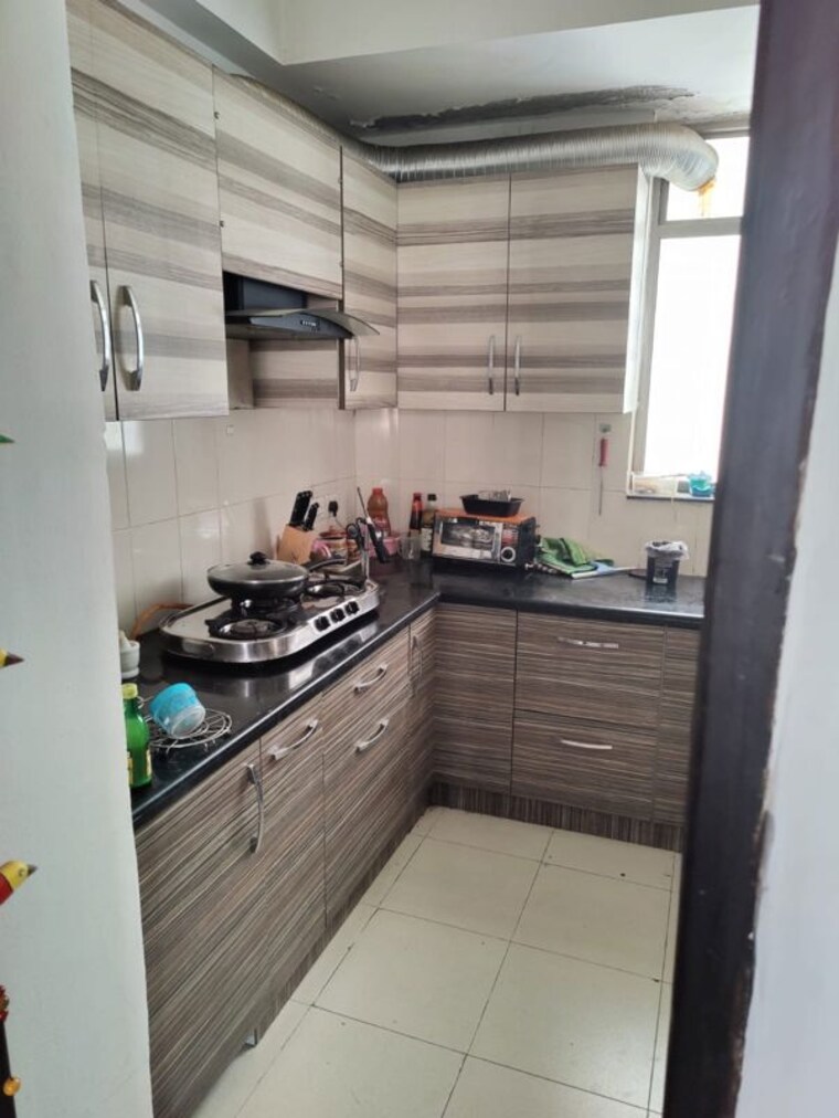 Kitchen, unitech-the-residences-gurgaon 3.5 Bedroom 1545 Sq.Ft. Apartment In Sector 33 Gurgaon 10549069
