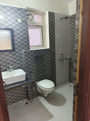 Bathroom in 2 BHK Apartment at Sikka Karmic Greens, Sector 78 – for Rent
