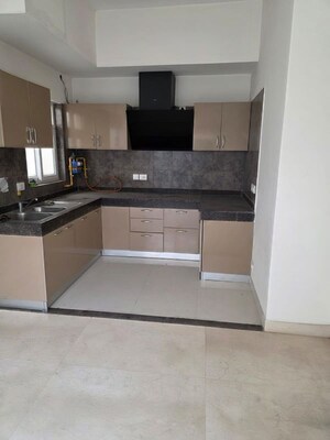 Kitchen in 3 BHK Builder Floor at Smart World Orchard, Sector 61 – for Sale