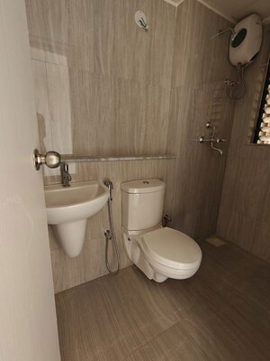 Bathroom in 2 BHK Apartment at Runwal Gardens, Dombivli East – for Sale