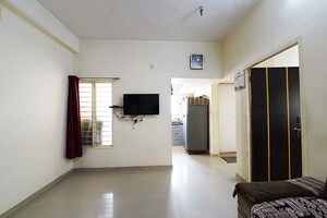 Living Room in 2 BHK Apartment at Nava Naroda – for Sale