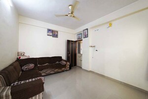 Living Room in 2 BHK Apartment at Nava Naroda – for Sale