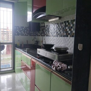 Kitchen in 1.5 BHK Apartment at Neel Sidhi Infinity, Khanda Colony – for Rent