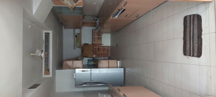 Kitchen, jaypee-green-sun-court-tower-iii 3 Bedroom 3850 Sq.Ft. Apartment In Jaypee Greens Greater Noida 10549344