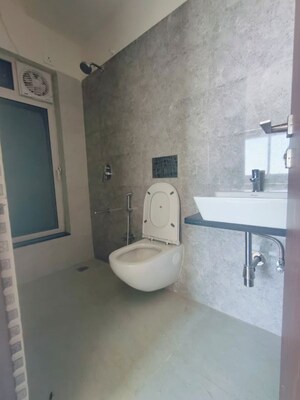 Bathroom in 1 BHK Apartment at Omkar Signet, Malad East – for Rent