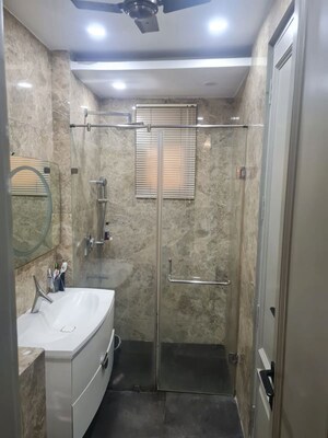 Bathroom in 3 BHK Builder Floor at New Rajinder Nagar – for Sale