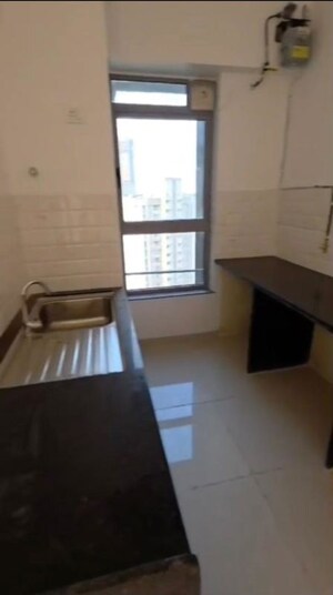 Kitchen in 3 BHK Apartment at Kalpataru Immensa, Kolshet Road – for Sale