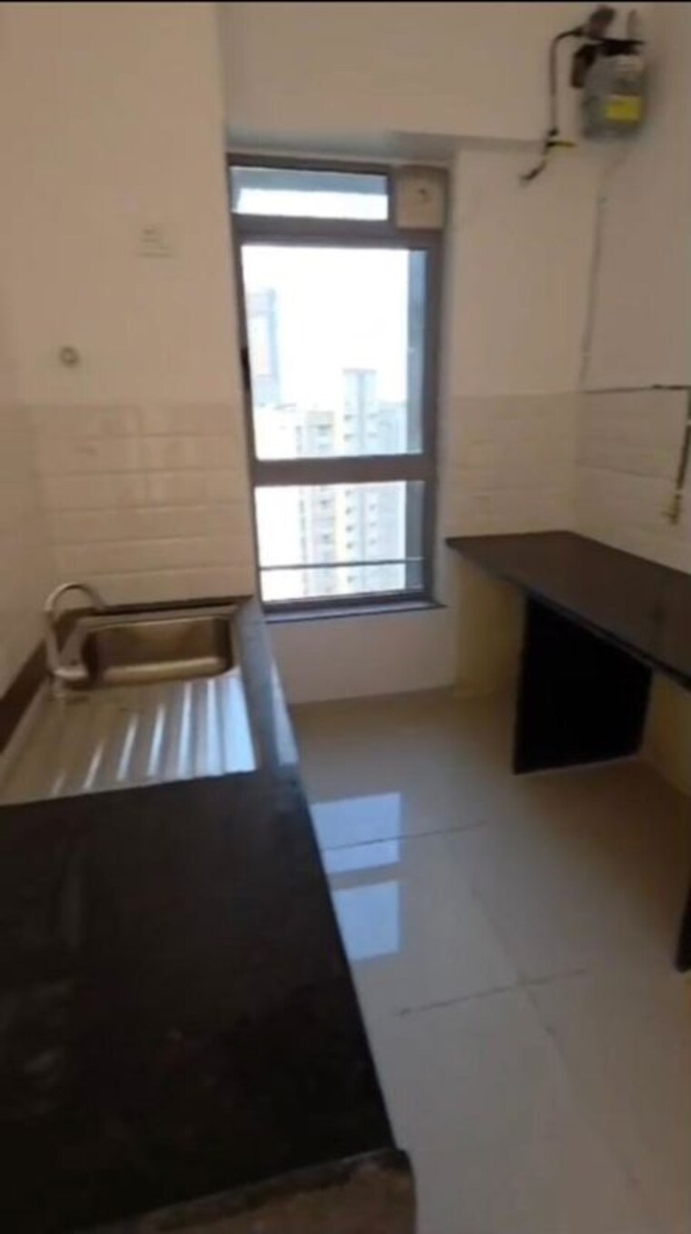 Kitchen, kalpataru-immensa 3 Bedroom 991 Sq.Ft. Apartment In Kolshet Road Thane 10549431