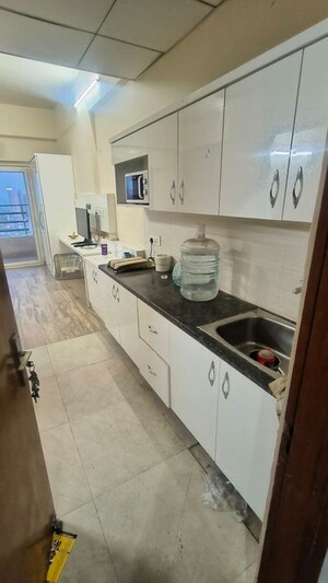 Kitchen in 1 RK Apartment at Paramount Golfforeste, Zeta I Greater Noida – for Rent