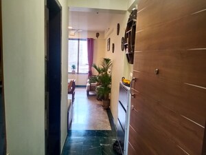 Building Lobby in 1.5 BHK Apartment at Godrej Emerald, Ghodbunder Road – for Rent
