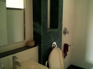 Bathroom in 2 BHK Apartment at Cosmos Jewels, Ghodbunder Road – for Rent