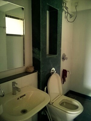 Bathroom in 2 BHK Apartment at Cosmos Jewels, Ghodbunder Road – for Rent