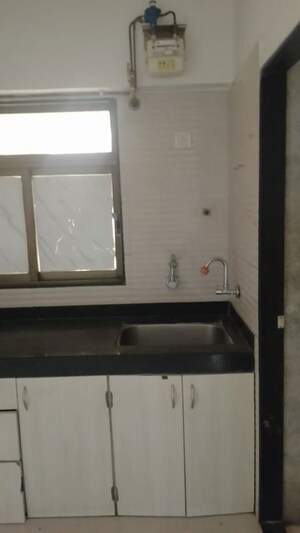 Kitchen in 1 BHK Apartment at Vintage The Pacific, Kharghar Sector 13 – for Sale