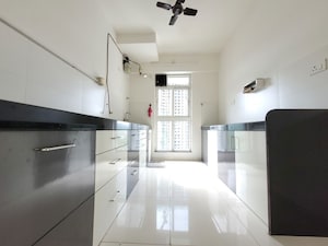 Kitchen in 3 BHK Apartment at Godrej Emerald, Ghodbunder Road – for Rent