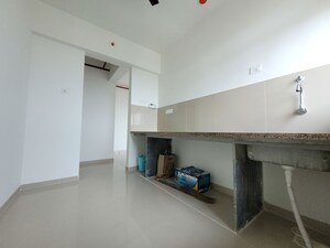 Kitchen in 2 BHK Apartment at Puranik City Reserva, Ghodbunder Road – for Rent