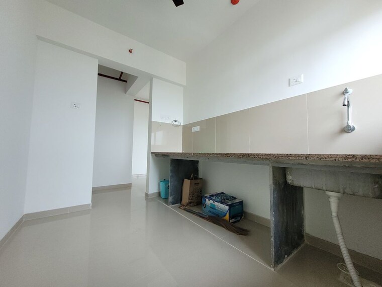 Kitchen, puranik-city-reserva 2 Bedroom 740 Sq.Ft. Apartment In Ghodbunder Road Thane 10549607
