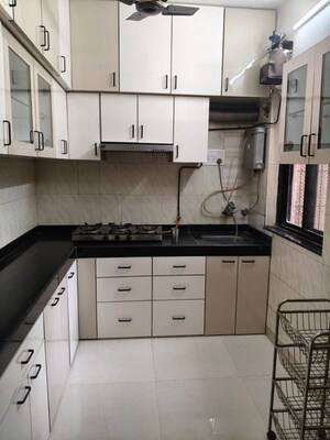 Kitchen in 2 BHK Apartment at Alaknanda CHS Nerul, Nerul Sector 19a – for Rent