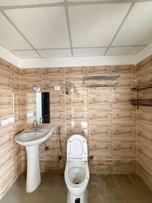 Bathroom in 3 BHK Apartment at Nirala Greenshire, Sector 2 Greater Noida – for Rent