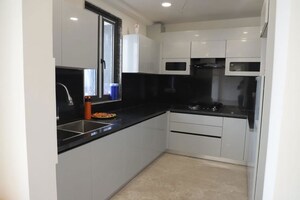 Kitchen in 4 BHK Apartment at Ansal API Versalia, Sector 67a – for Rent