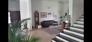 Living Room in 4 BHK Apartment at Adarsh Palm Meadows, Whitefield – for Sale