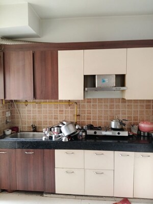 Kitchen in 2 BHK Apartment at Mahagun Mywoods, Sector 16c Greater Noida – for Sale