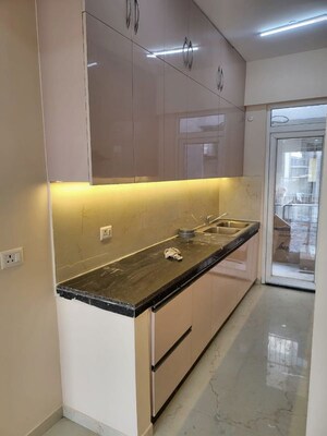 Kitchen in 3.5 BHK Builder Floor at Smart World Gems, Sector 89 – for Sale