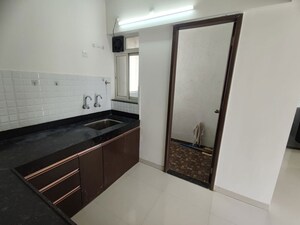 Kitchen in 3 BHK Apartment at Majestique Rhythm County, Handewadi – for Rent
