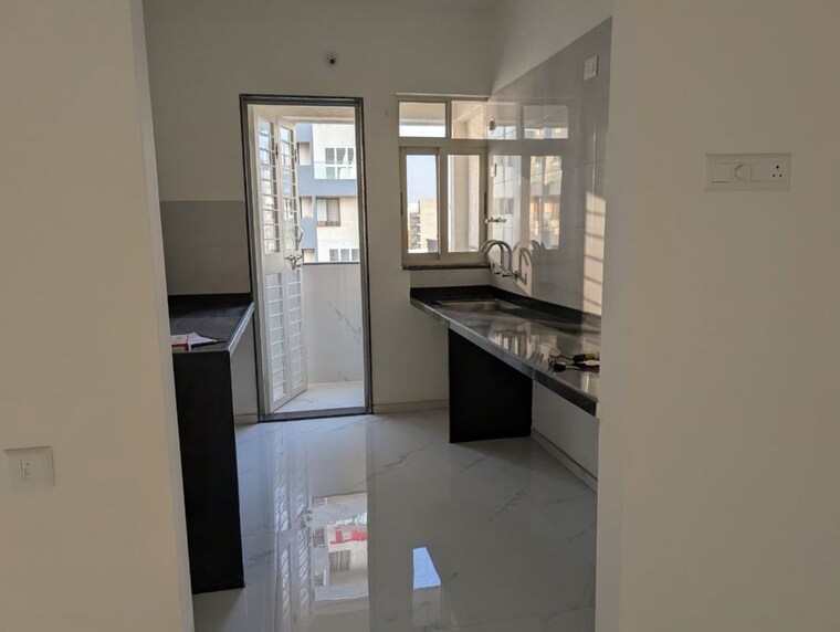 Kitchen, linux-bonheur 3 Bedroom 1000 Sq.Ft. Apartment In Wakad Pune 10549907